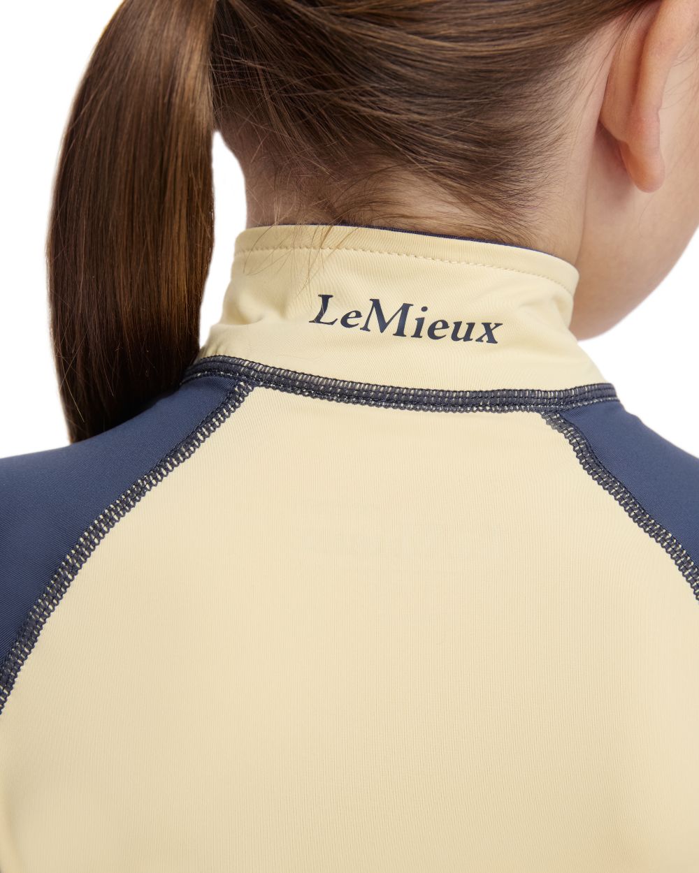 Mimosa coloured LeMieux Mini Base Layer on white background 