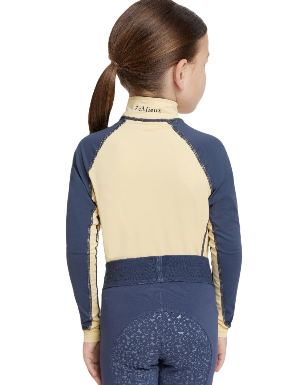 Mimosa coloured LeMieux Mini Base Layer on white background 