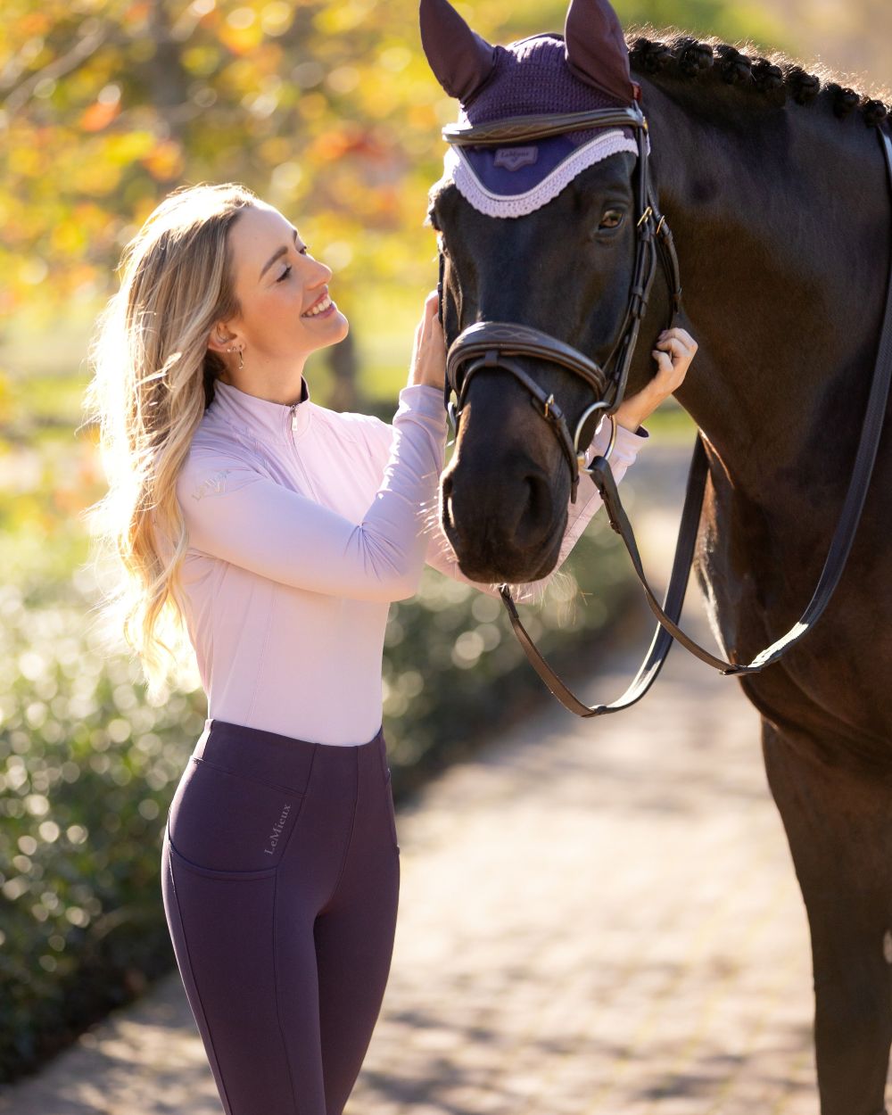 Juniper coloured LeMieux Naomi Pull On Breeches on outdoor background 