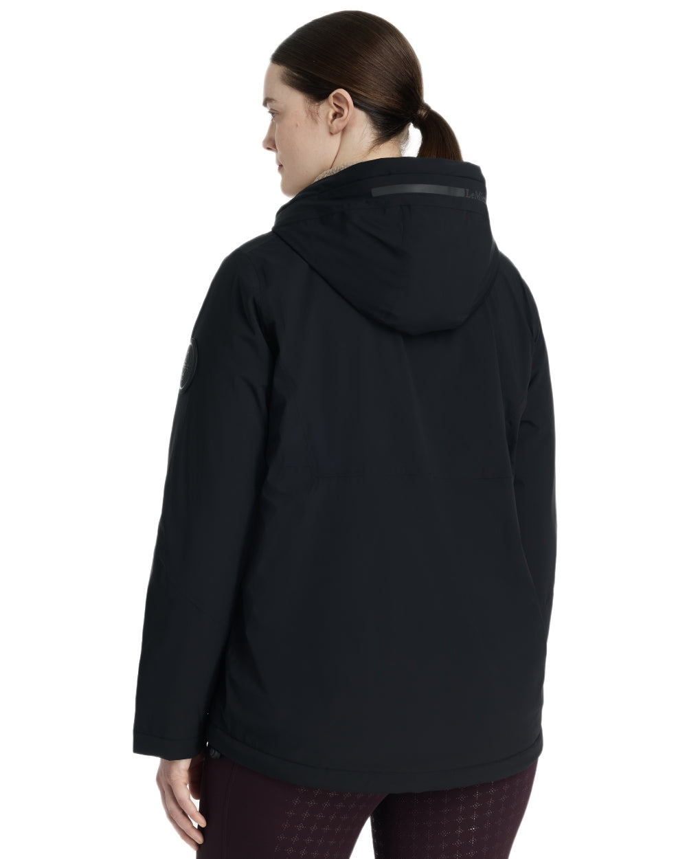 Black coloured LeMieux Phoebe Half Zip Waterproof Anorak on white background 
