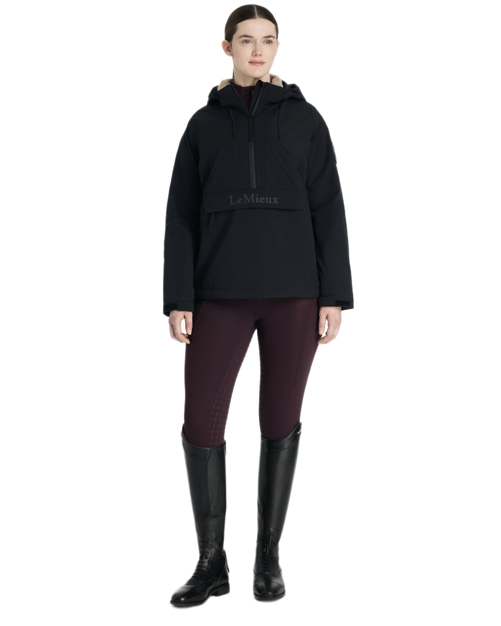 Black coloured LeMieux Phoebe Half Zip Waterproof Anorak on white background 