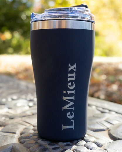 Navy coloured LeMieux Stainless Steel Insulated Travel Cup on outdoor background 