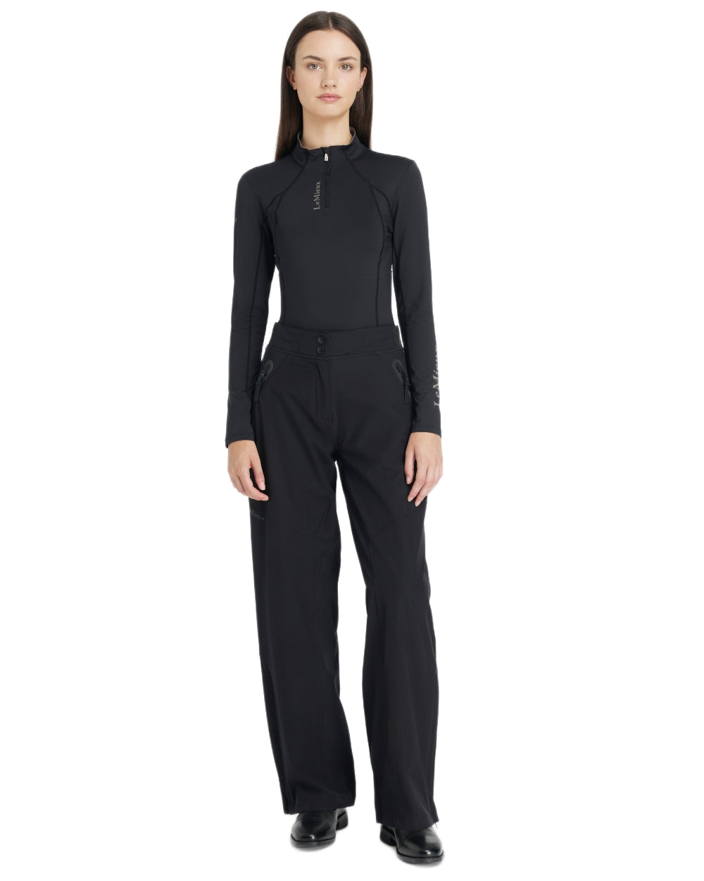 Black coloured LeMieux Womens Stormwear Waterproof Trousers on white background 