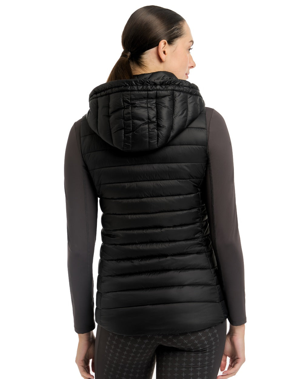 Black coloured LeMieux Tilly Hooded Puffer Gilet on white background 