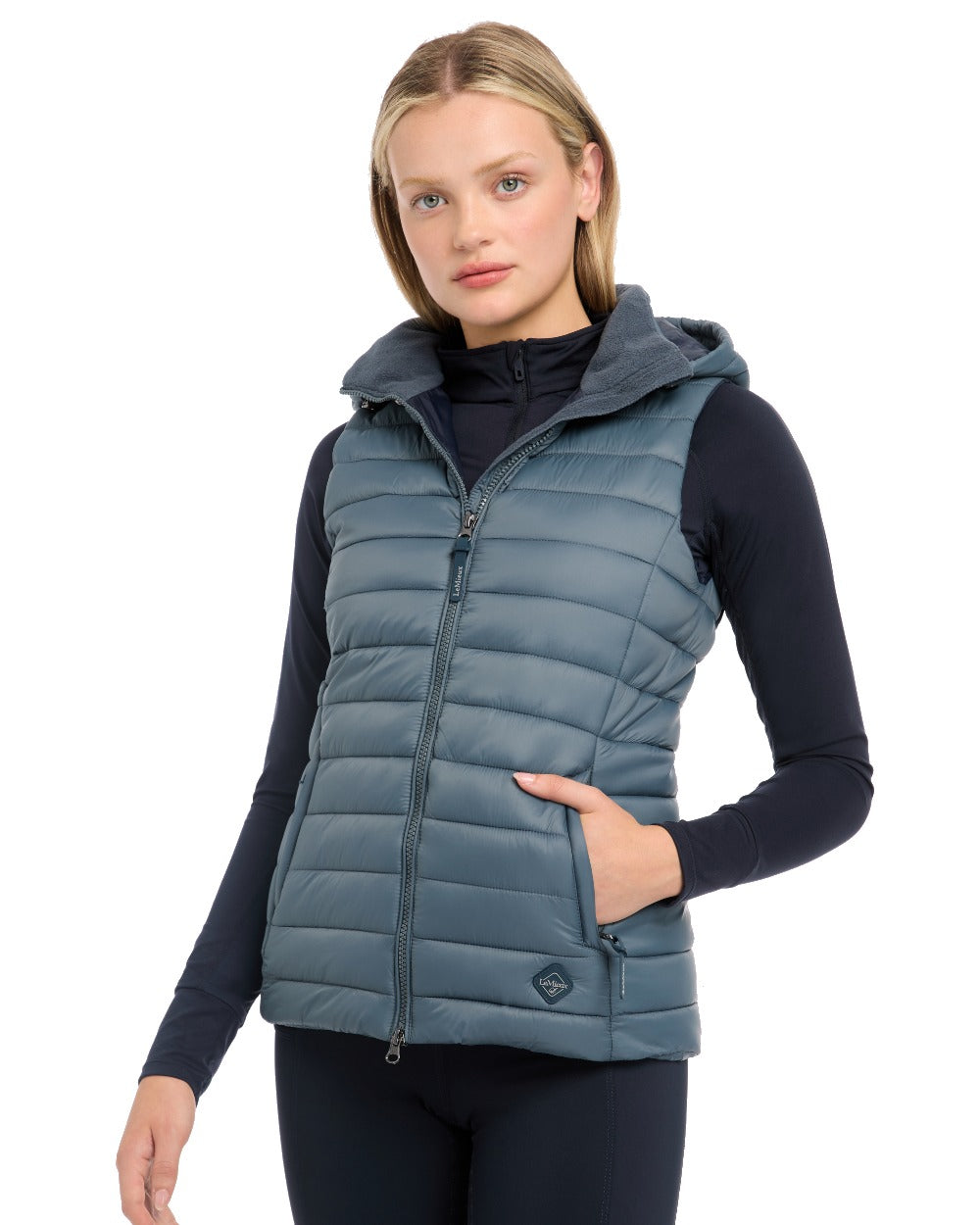 Petrol coloured LeMieux Tilly Hooded Puffer Gilet on white background 