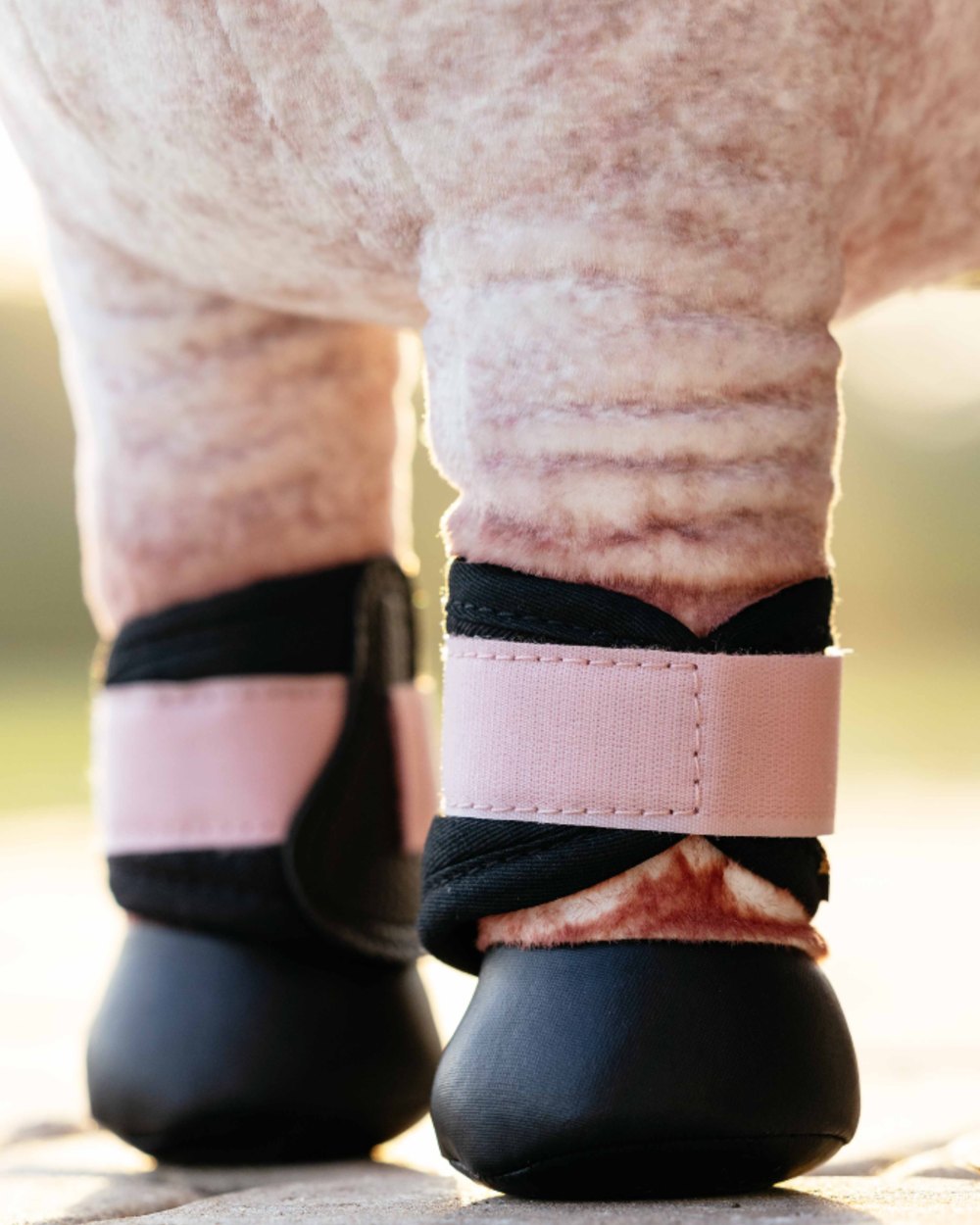Blossom Coloured LeMieux Toy Pony Grafter Boots On A Outdoor Background 