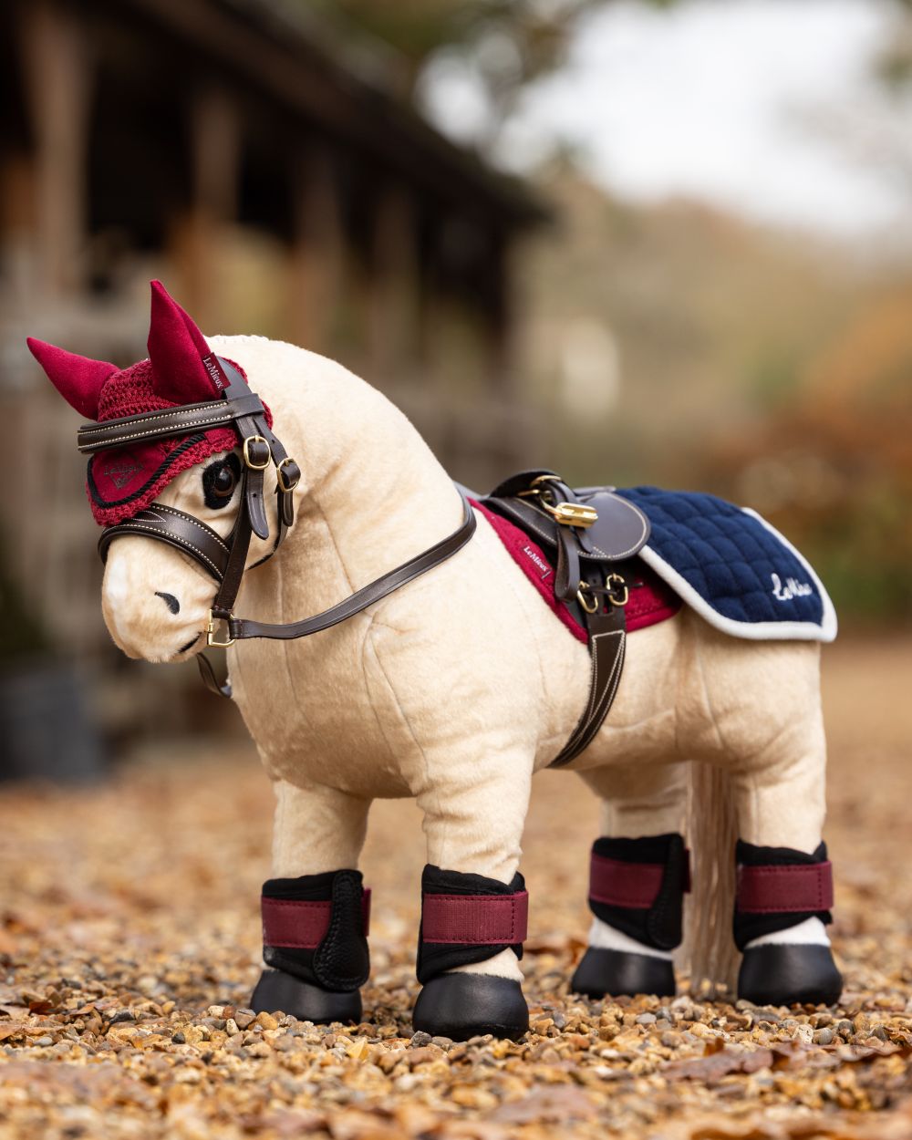 Navy coloured LeMieux Toy Pony Quarter Sheet on outdoor background 