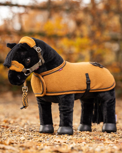 Alpine coloured LeMieux Toy Pony Vogue Headcollar on blurry background 