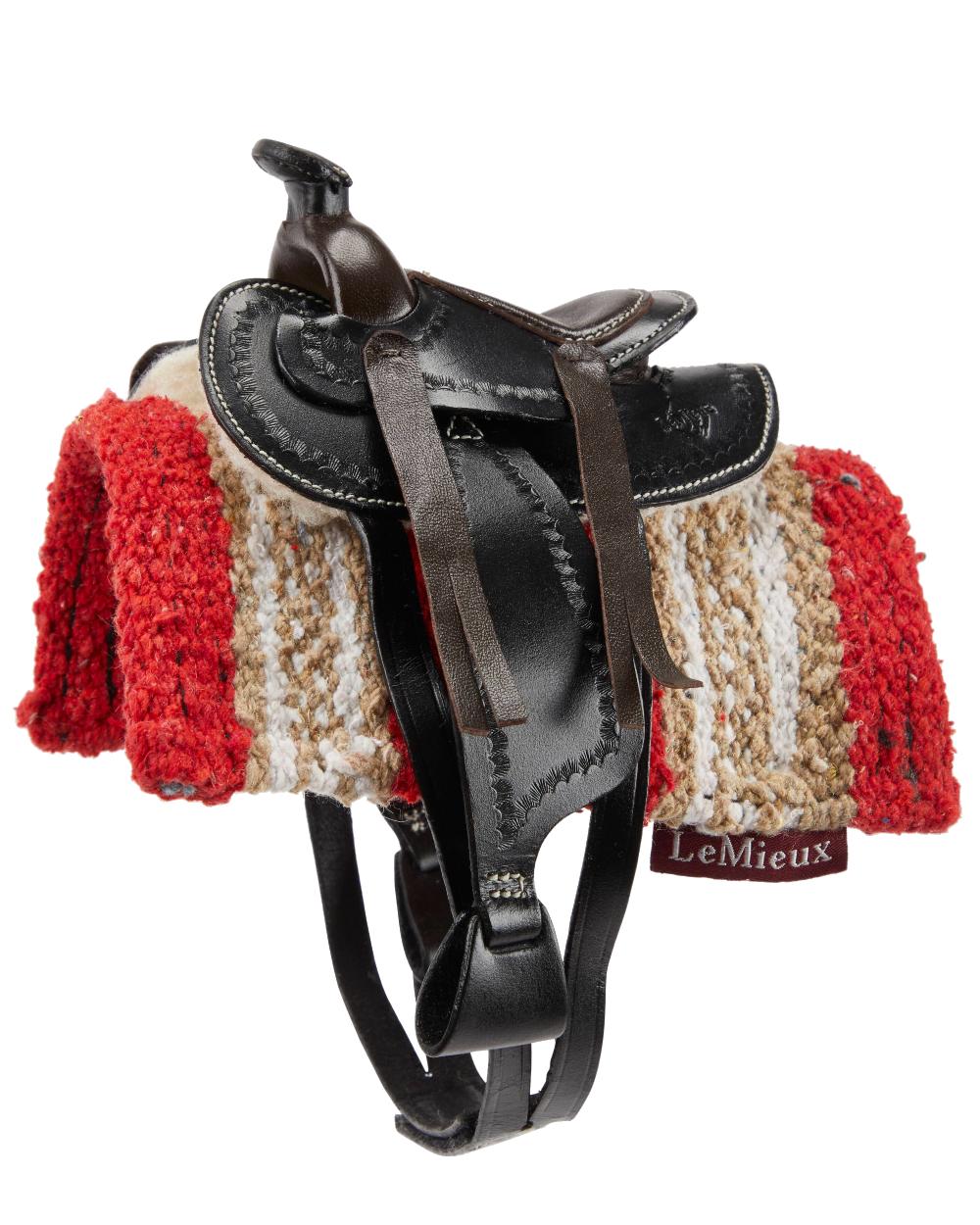 Black coloured LeMieux Toy Pony Western Saddle on white background 