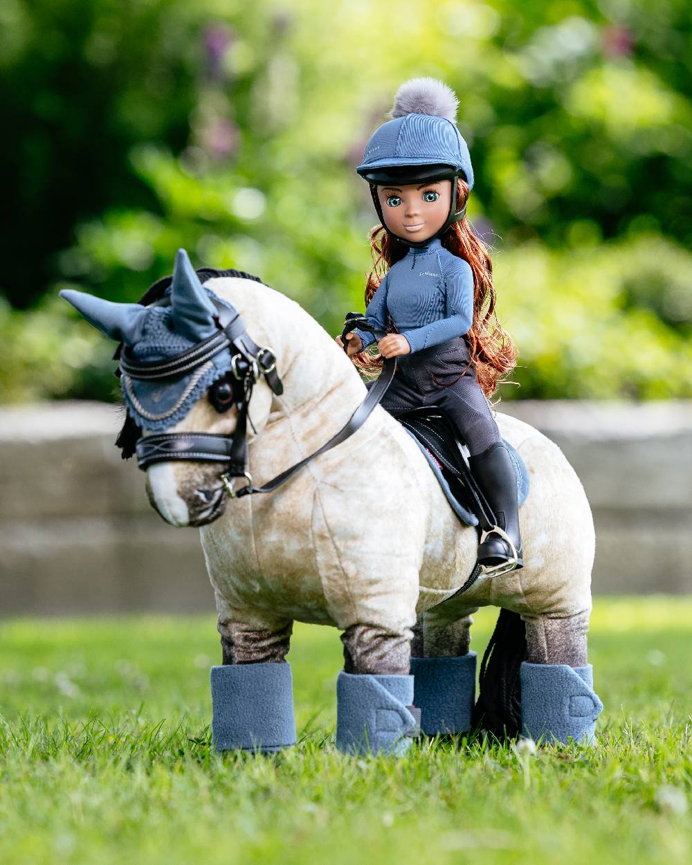 LeMieux Toy Rider Olivia On Outdoor Background
