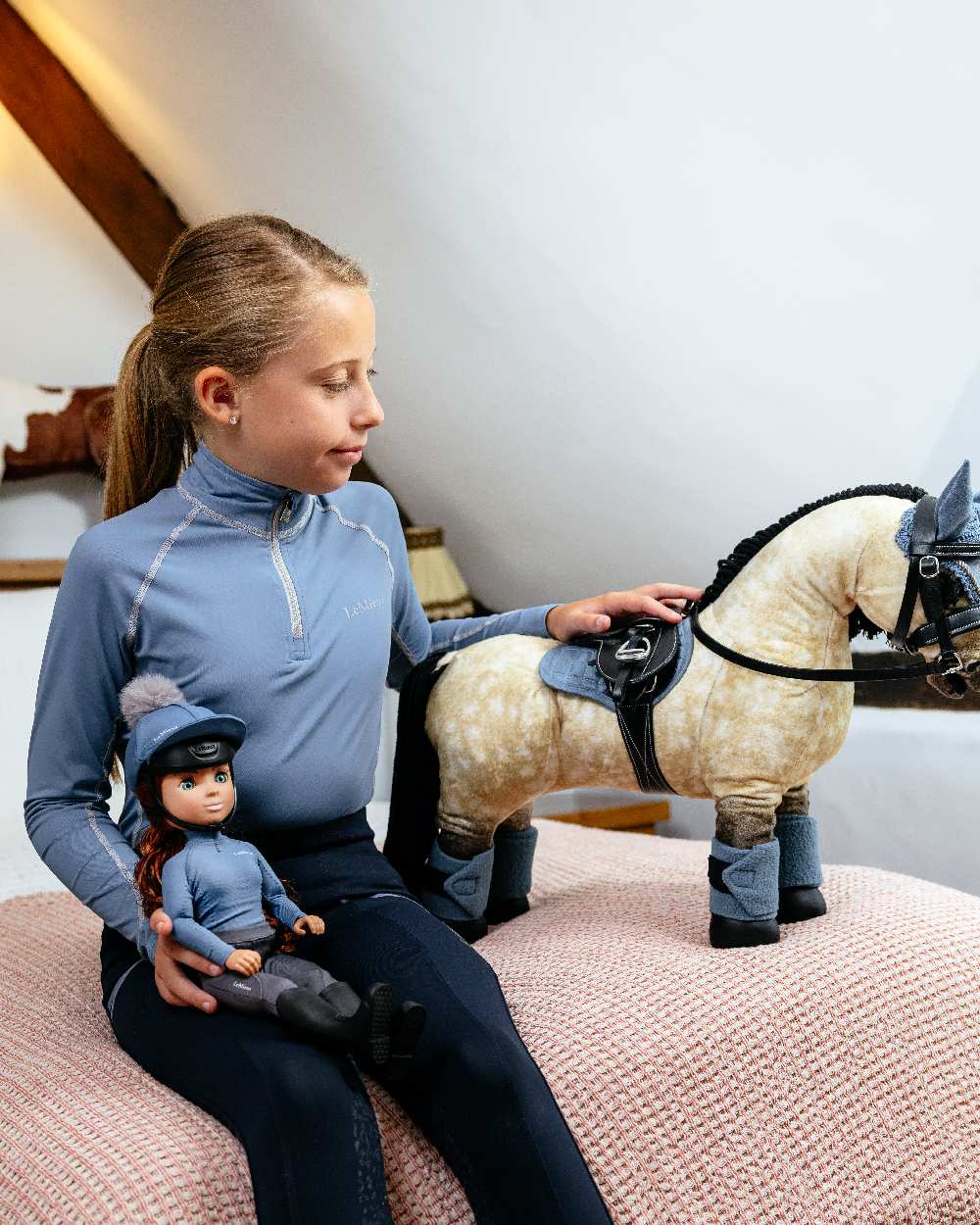 LeMieux Toy Rider Olivia On Indoor Background