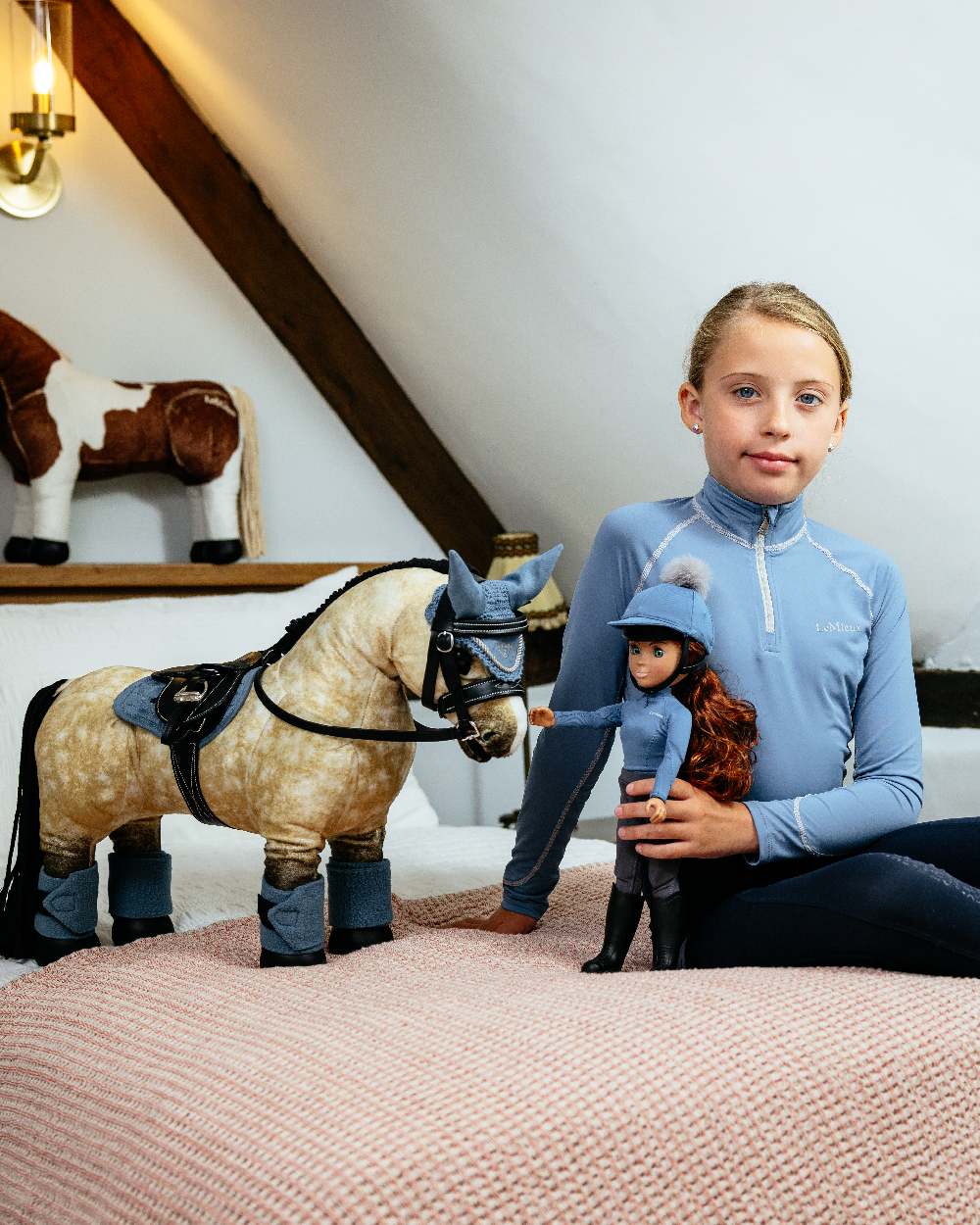 LeMieux Toy Rider Olivia On Indoor Background