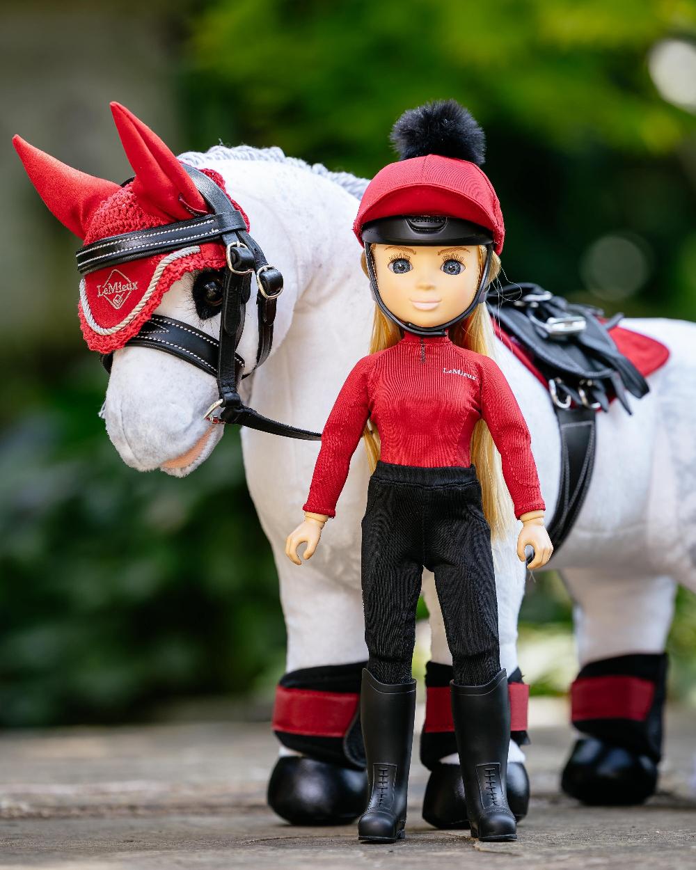 Chilli Coloured LeMieux Toy Rider Outfit on outdoor background 