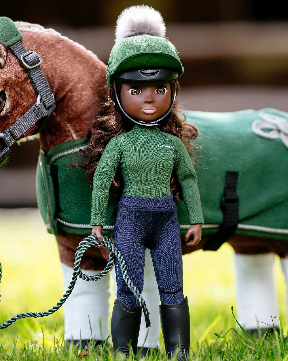 Hunter Green Coloured LeMieux Toy Rider Outfit on outdoor background 