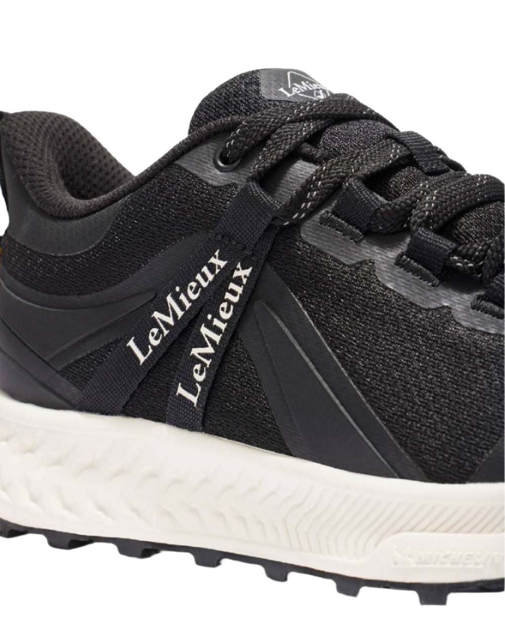 Black coloured LeMieux Trax Waterproof Trainers on white background 