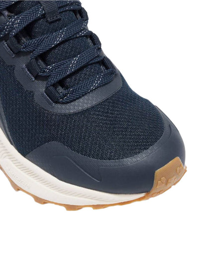 Navy coloured LeMieux Trax Waterproof Trainers on white background 