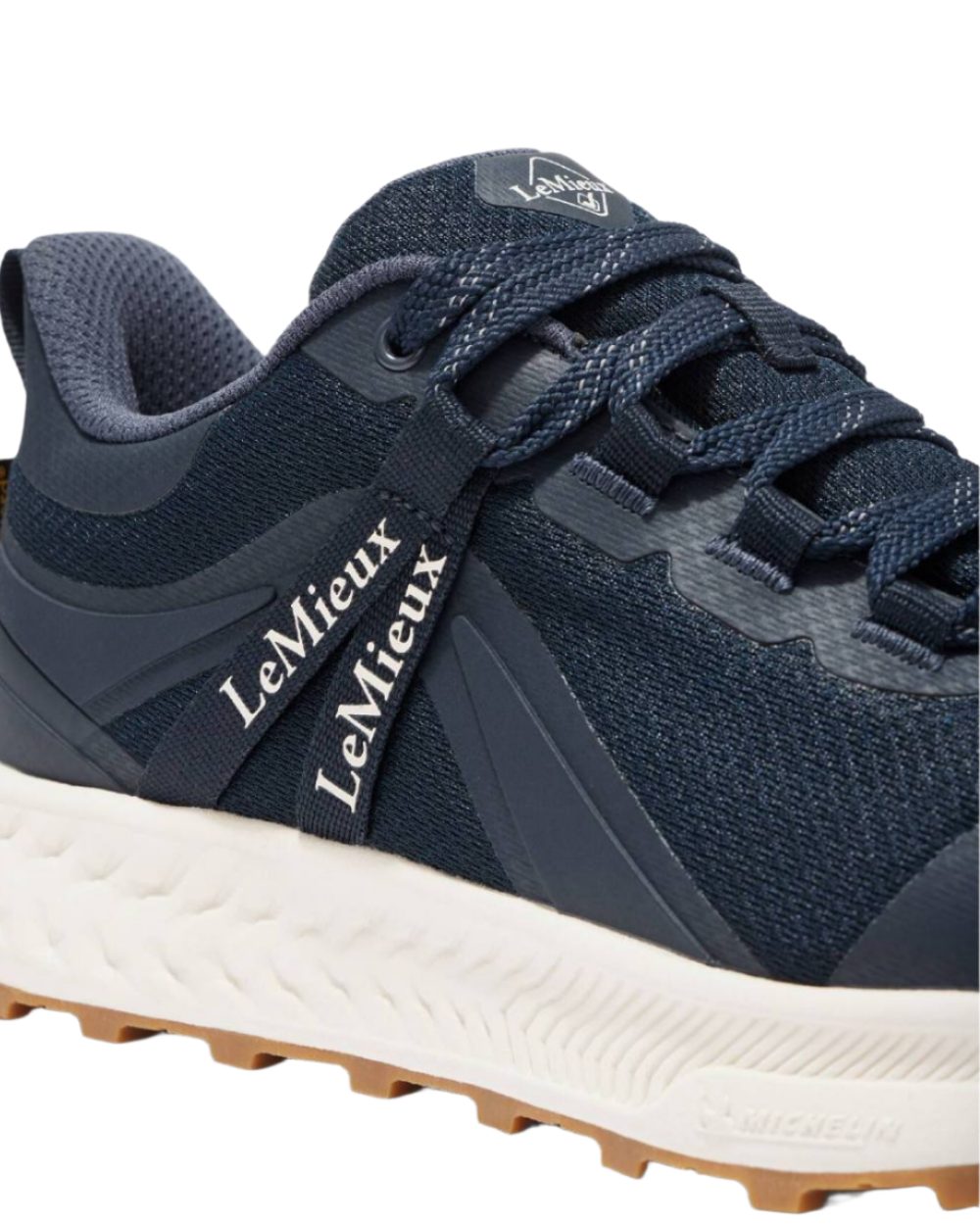 Navy coloured LeMieux Trax Waterproof Trainers on white background 