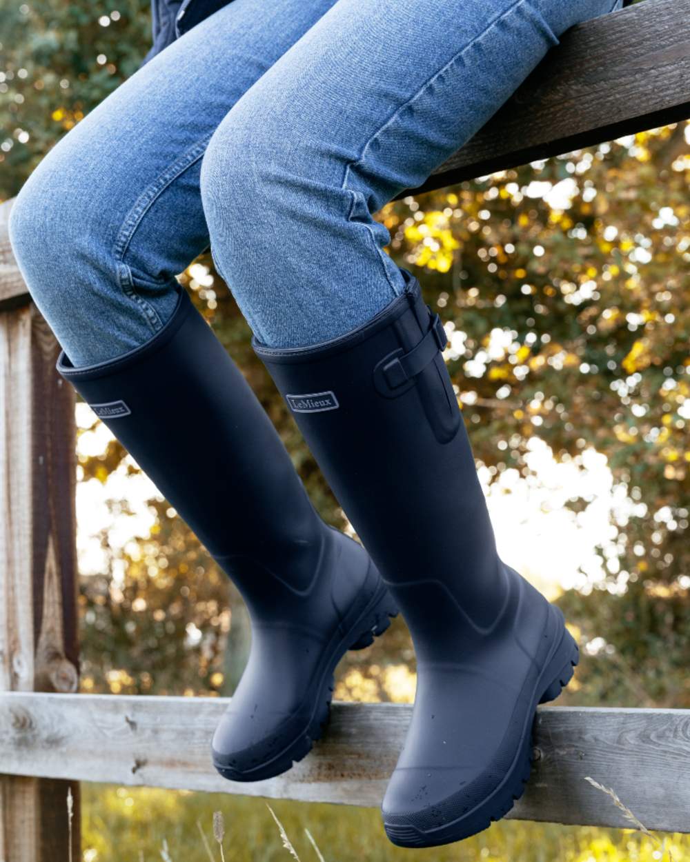Navy coloured LeMieux Womens Bramshaw Welly on outdoor background 
