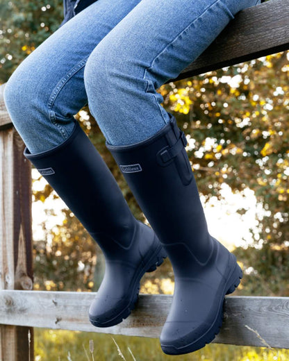 Navy coloured LeMieux Womens Bramshaw Welly on outdoor background 