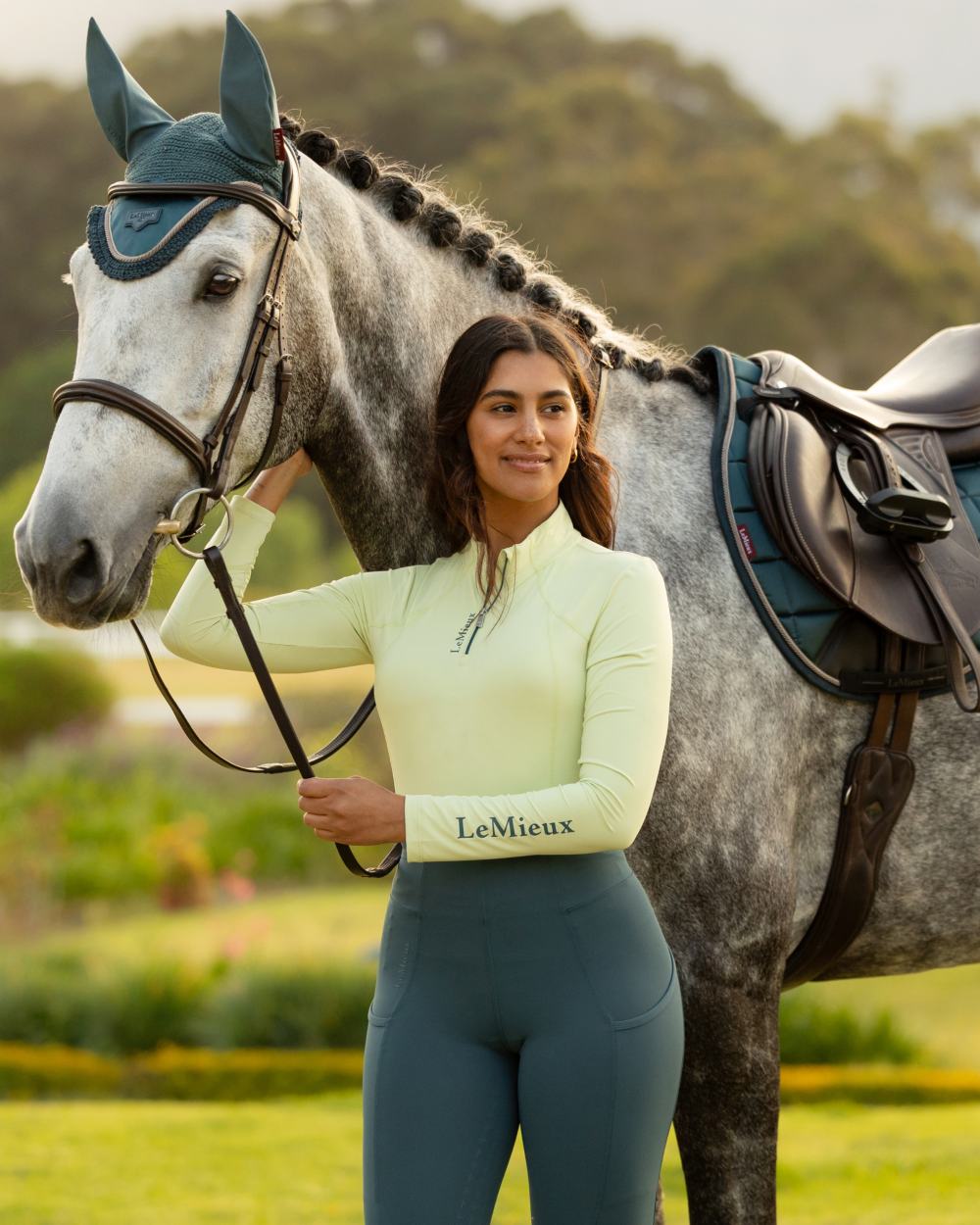 Macaron coloured LeMieux Womens Classique Base Layer on grassy background 