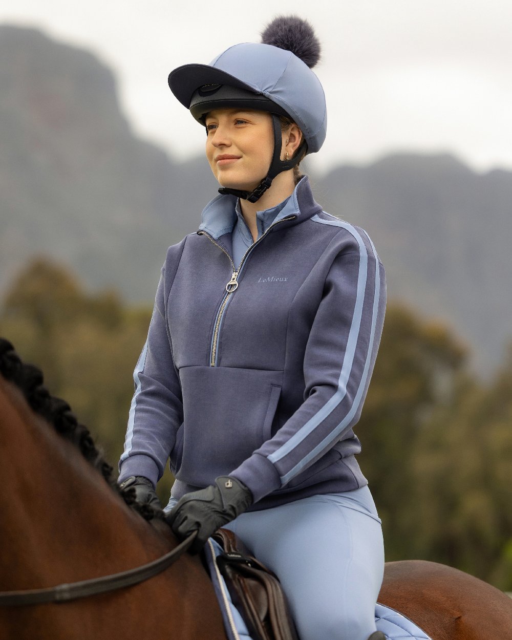 Navy coloured LeMieux Womens Connie Half Zip Sweatshirt on outdoor background 
