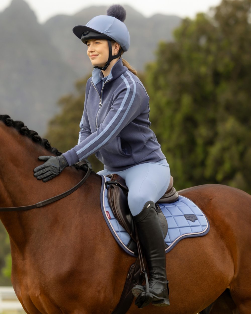 Navy coloured LeMieux Womens Connie Half Zip Sweatshirt on outdoor background 