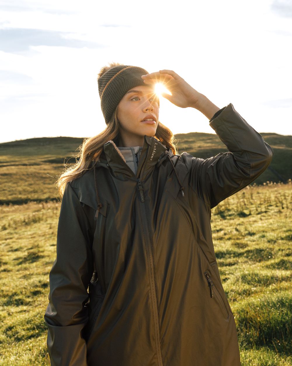 Alpine Coloured LeMieux Elements Coat On A Forest Background 