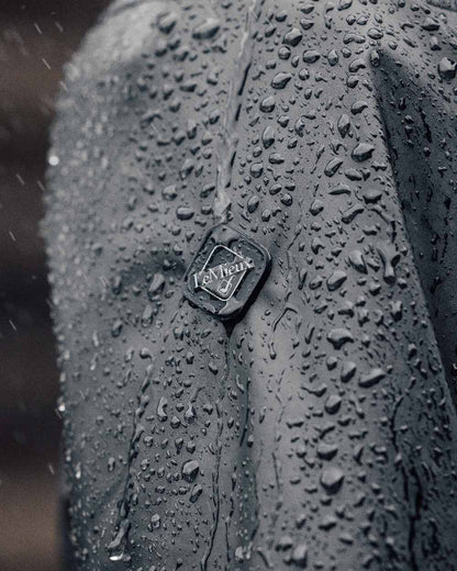 Black Coloured LeMieux Elements Coat On A Blurry Background 