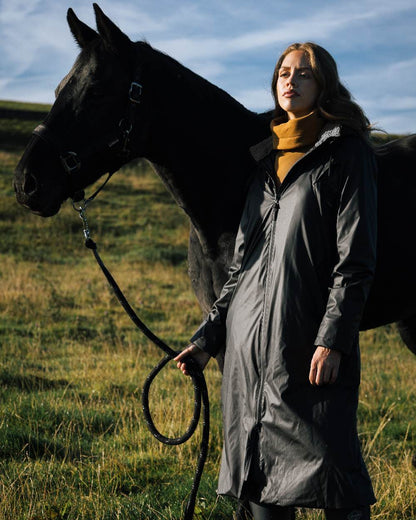 Black Coloured LeMieux Elements Coat On A Land Background 