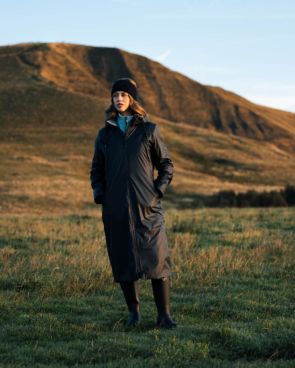 Navy Coloured LeMieux Elements Coat On Mountain Background 