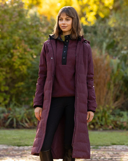 Bramble Coloured LeMieux Womens Erin Waterproof Padded Coat on Outdoor Ground Background 