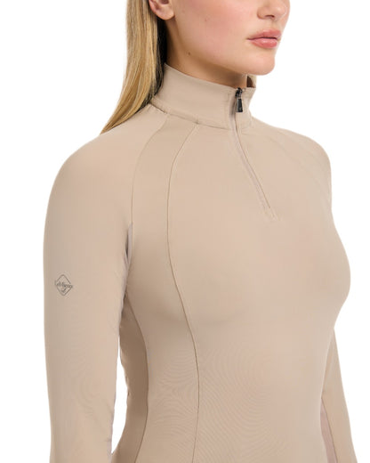Almond coloured LeMieux Womens Halle Lightweight Base Layer on white background 
