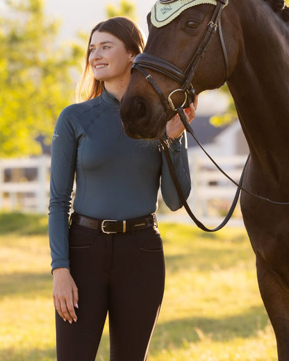 Jungle coloured LeMieux Womens Halle Lightweight Base Layer on outdoor background 