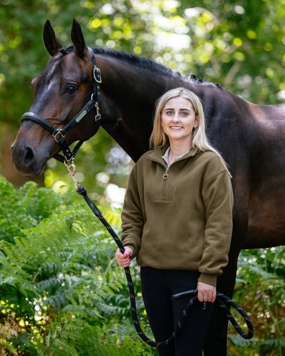 Alpine coloured LeMieux Womens Keira Quarter Neck Sweatshirt on tree background 