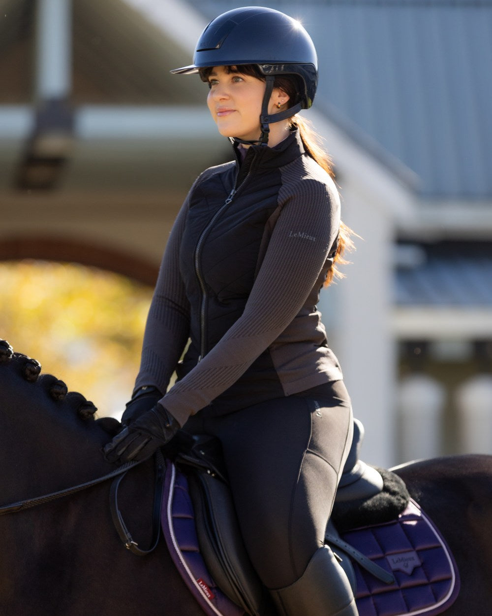 Black coloured LeMieux Womens Maddie Jacket on blurry background 