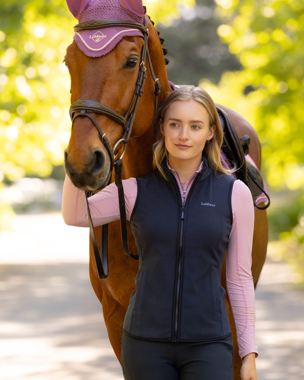 Navy coloured LeMieux Womens Pamela Gilet on outdoor background 