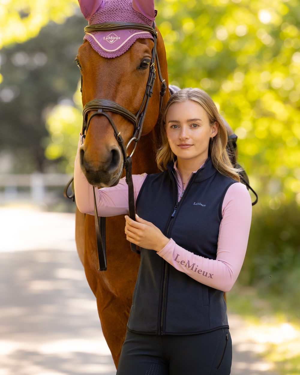 Navy coloured LeMieux Womens Pamela Gilet on outdoor background 