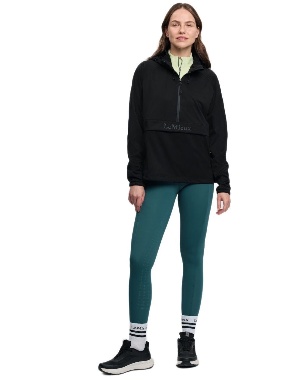 Black coloured LeMieux Womens Perri Half Zip Waterproof Jacket on white background 