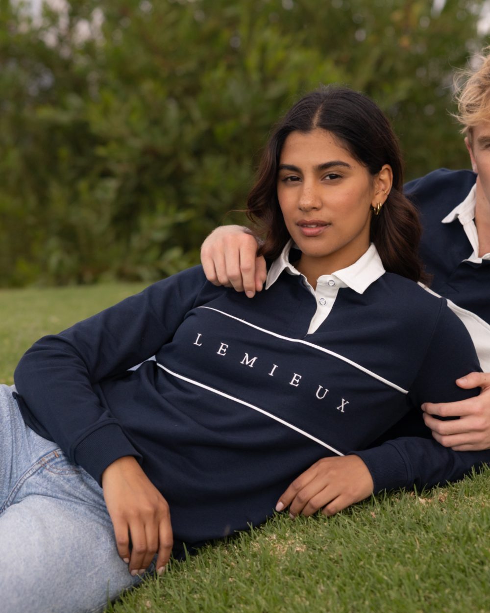 Navy coloured LeMieux Womens Rochelle Rugby Shirt on garden background 