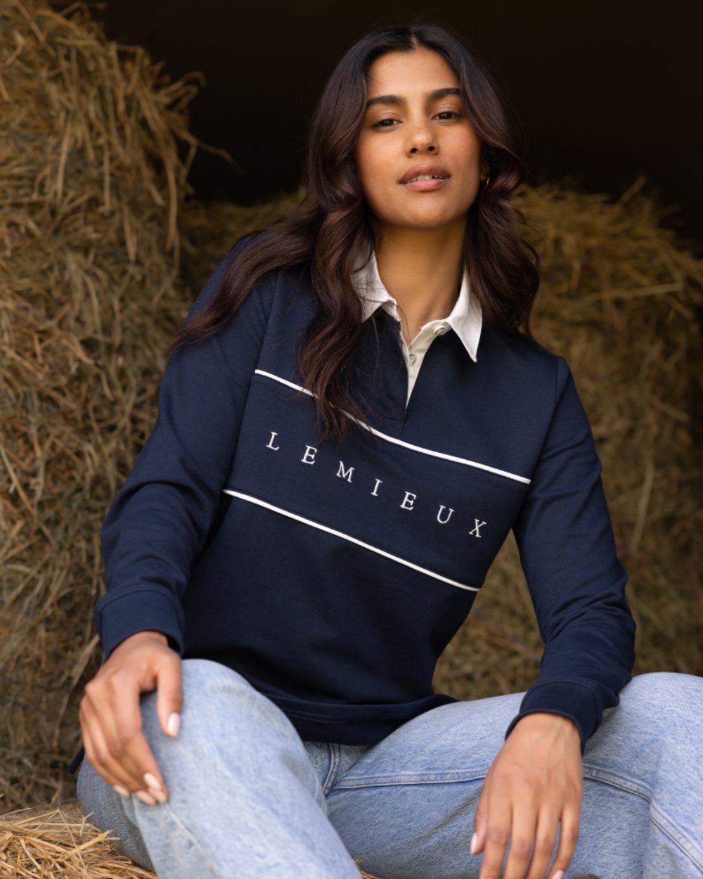 Navy coloured LeMieux Womens Rochelle Rugby Shirt on grass background 