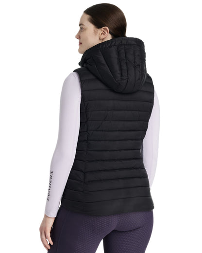Black coloured LeMieux Womens Rose Hooded Puffer Gilet on white background 
