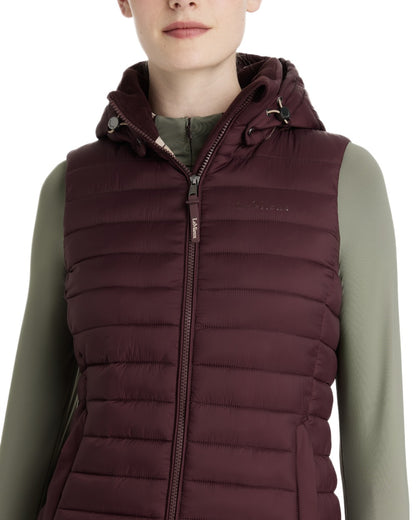 Damson coloured LeMieux Womens Rose Hooded Puffer Gilet on white background 