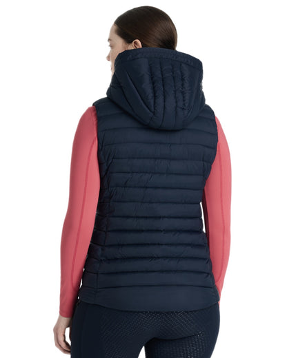 Navy coloured LeMieux Womens Rose Hooded Puffer Gilet on white background 
