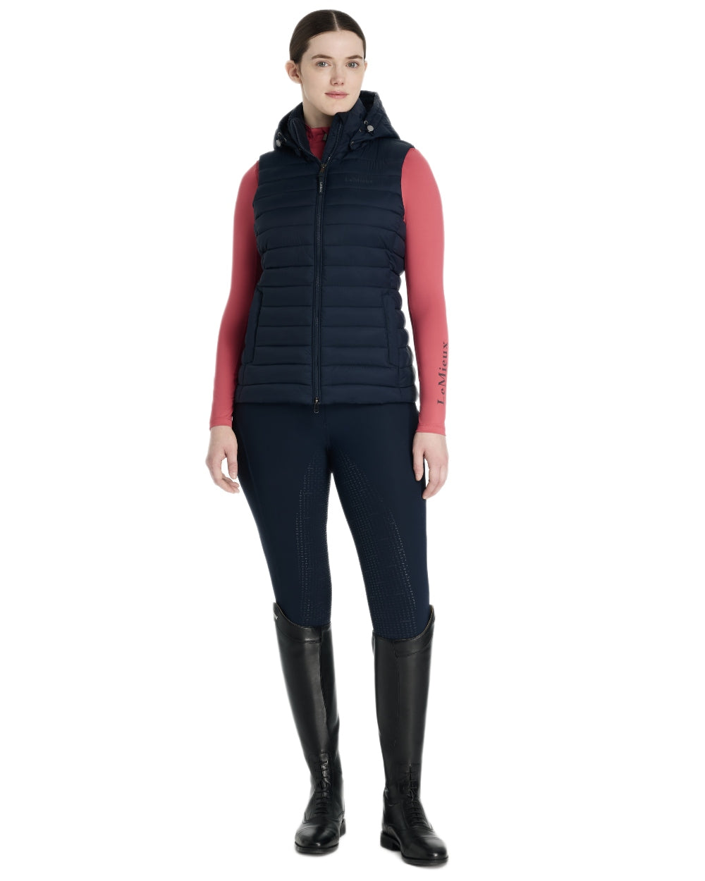 Navy coloured LeMieux Womens Rose Hooded Puffer Gilet on white background 