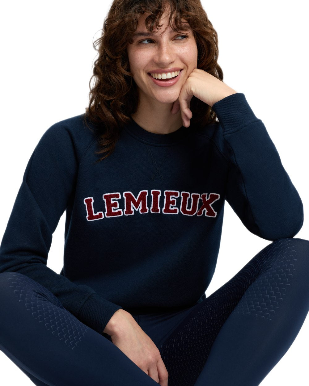 Navy coloured LeMieux Womens Vida Varsity Crew Neck Sweatshirt on white background 