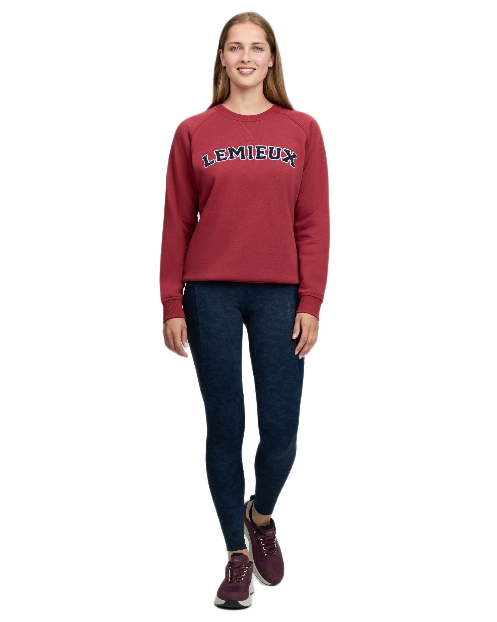 Russet coloured LeMieux Womens Vida Varsity Crew Neck Sweatshirt on white background 