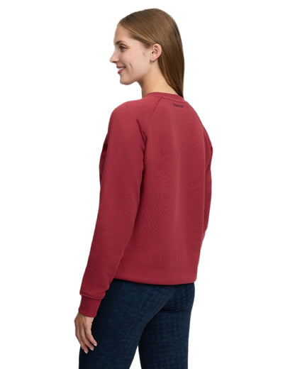 Russet coloured LeMieux Womens Vida Varsity Crew Neck Sweatshirt on white background 