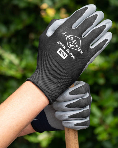 Black coloured LeMieux Work Gloves on outdoor background 