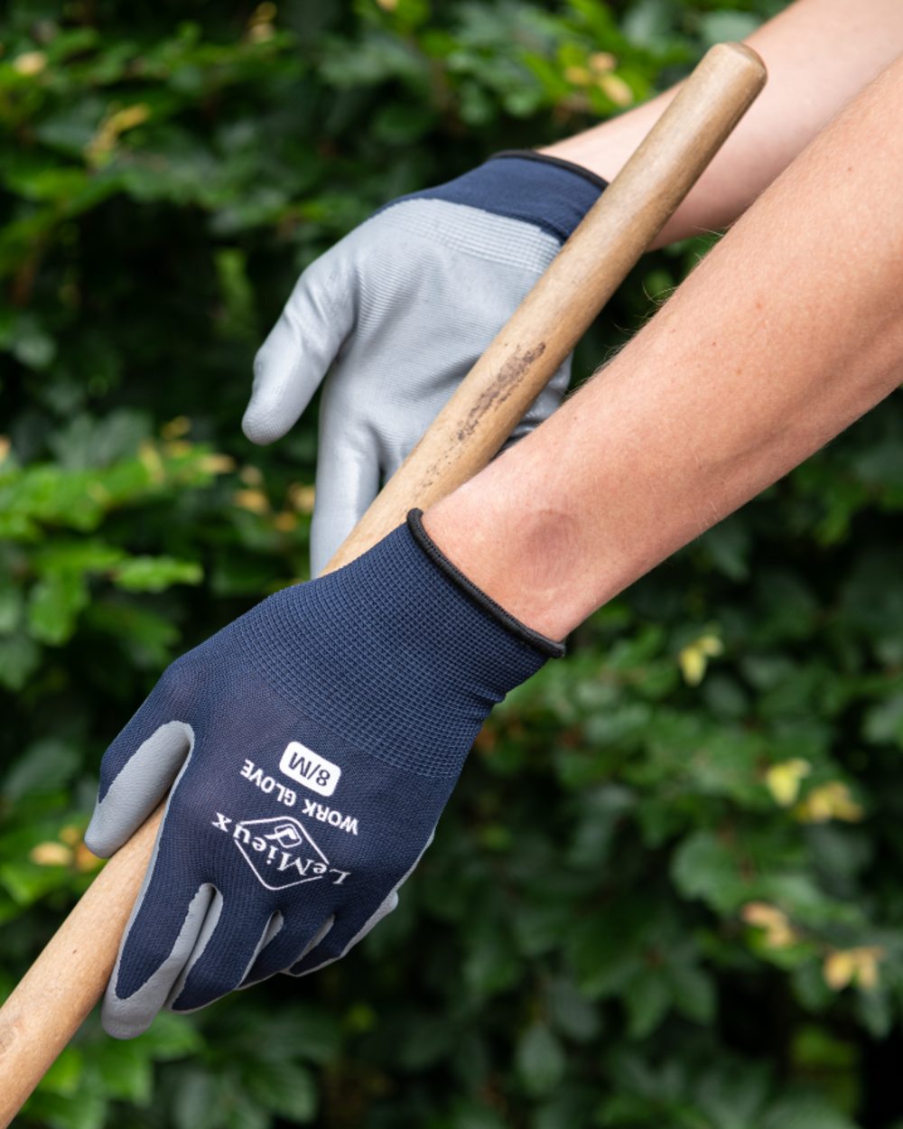 Navy coloured LeMieux Work Gloves on outdoor background 