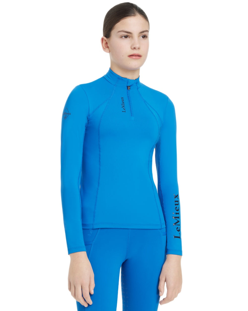 Benetton Blue coloured LeMieux Young Rider Classique Base Layer on white background 
